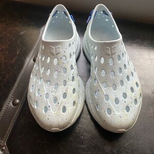 White Athletic Shoes with Blue Accents